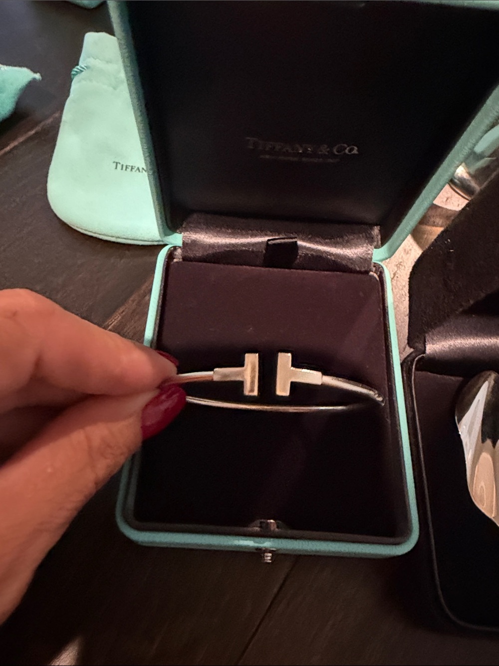 Tiffany & Co. Silver T- motif Hinged Bracelet with Black Interior